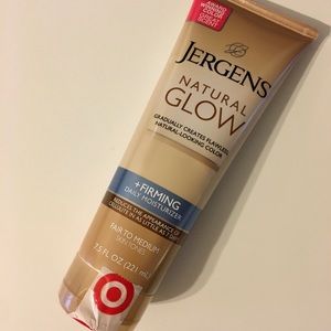 2 bottles of Jergens Natural Glow Moisturizer